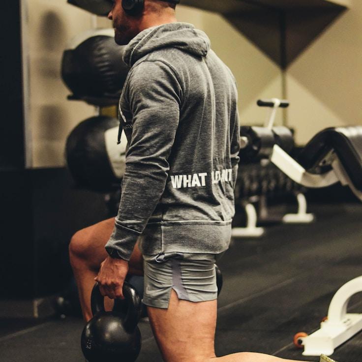 Women in a fitness class doing stretching and mobility exercises